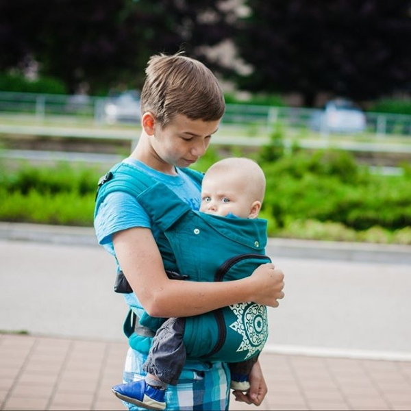 Огляд різновидів моделей ерго-рюкзаків Гусленок